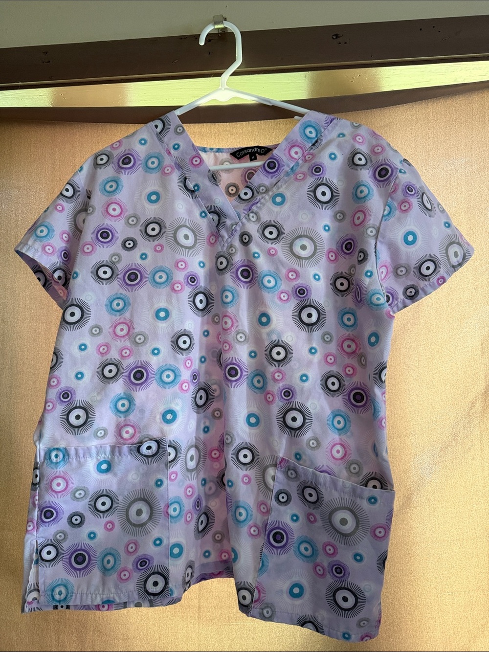 Cassandra O Lavender Circular Print V-Neck Scrub Top